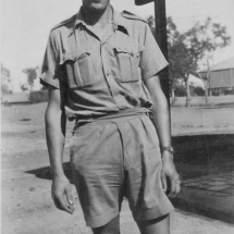 Ron Chapman at RAF Habbinaya Iraq likely1943. Note the wrist strap that denoted rank when wearing shirtsleeves.